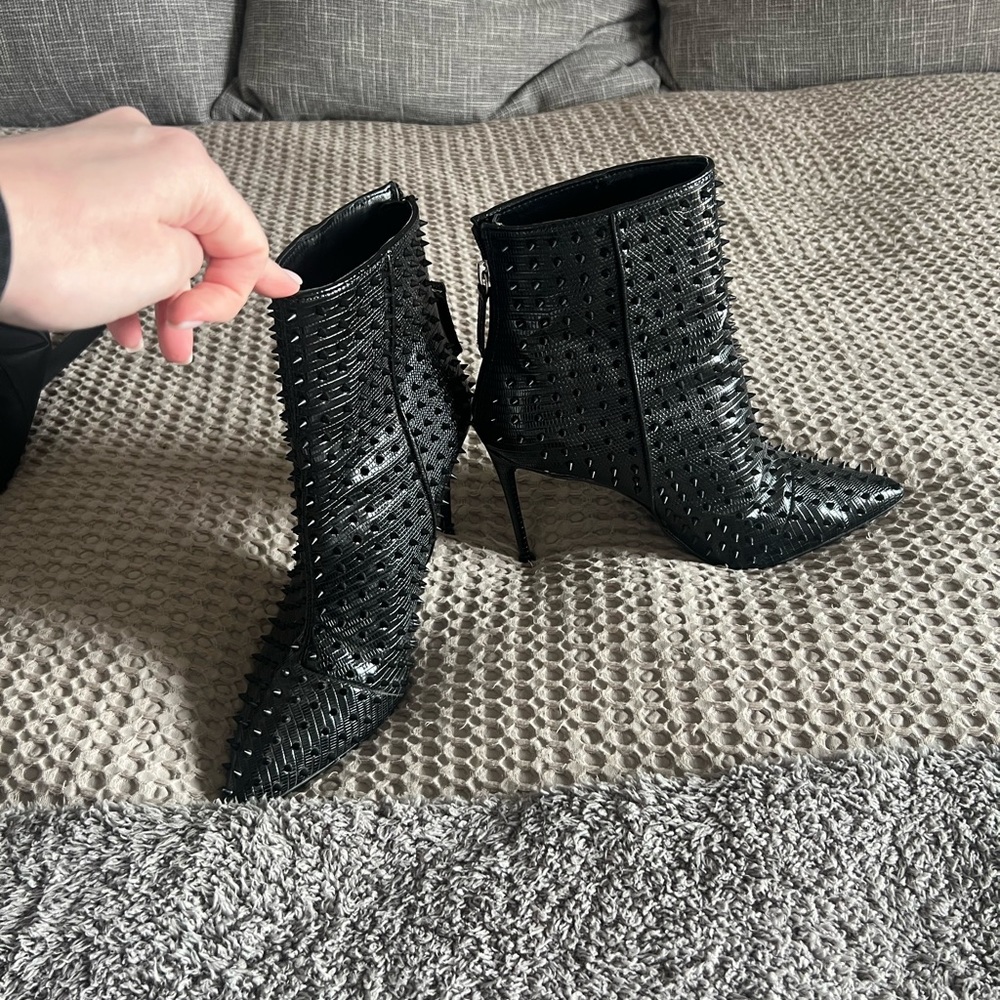 Steve Madden. Black spike bootie